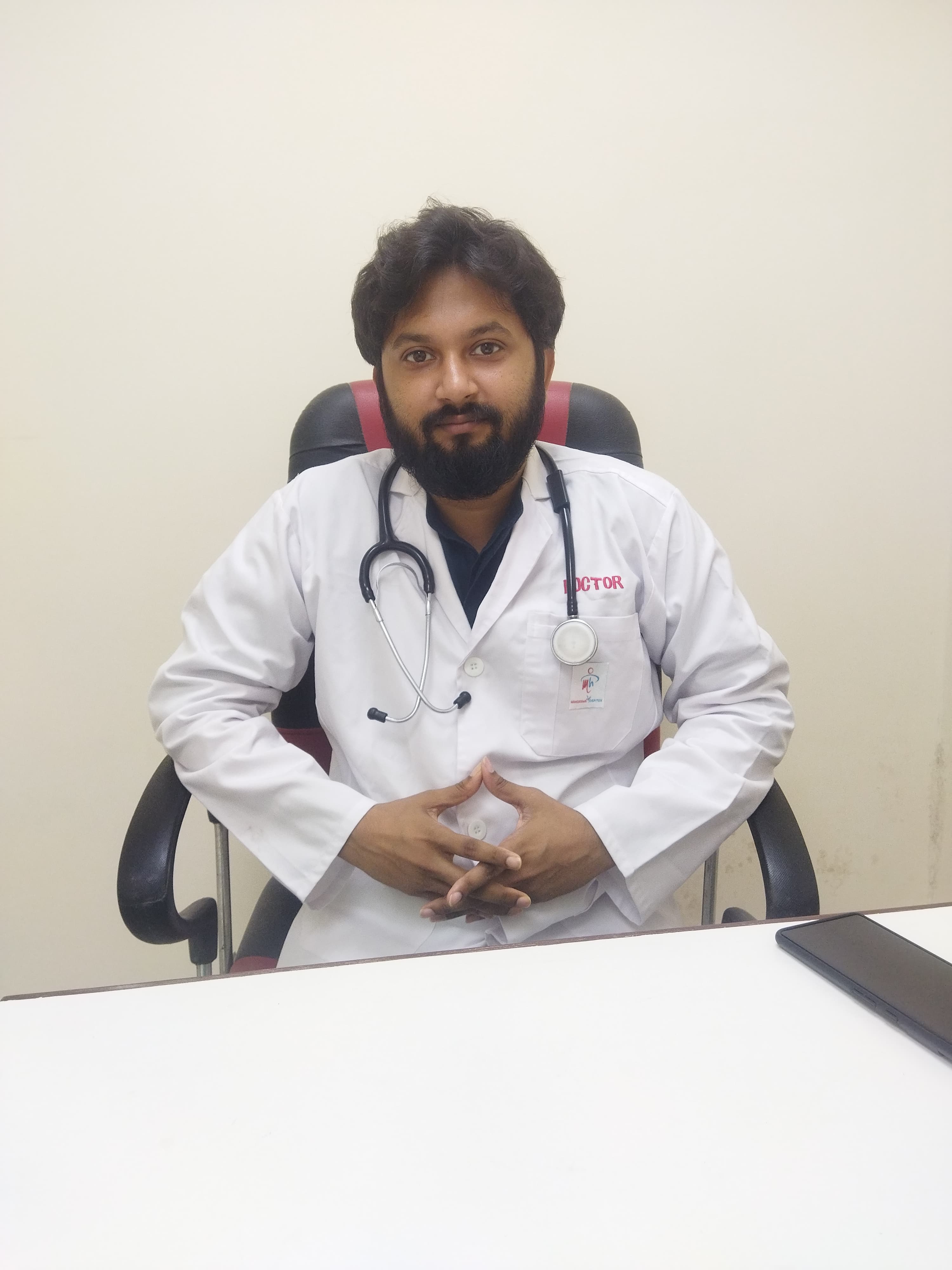 Dr. MAINAK SAHA